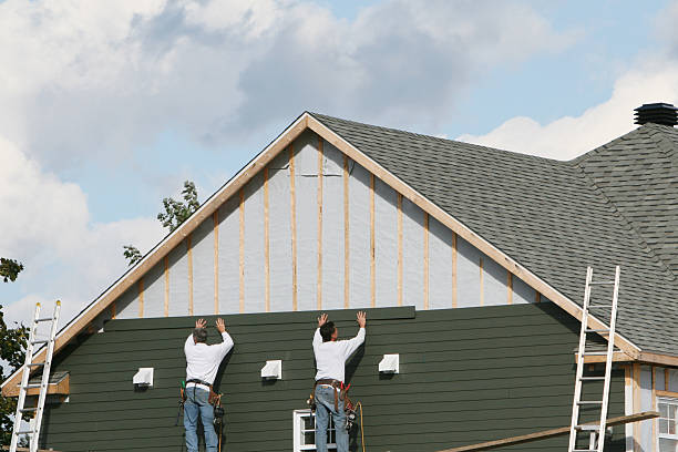 Professional Emergency Siding Repair technician working in Wendel, PA